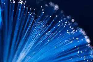 Fiber optical network cables glowing with light